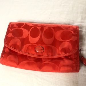 Orange Coach Toiletry Bag